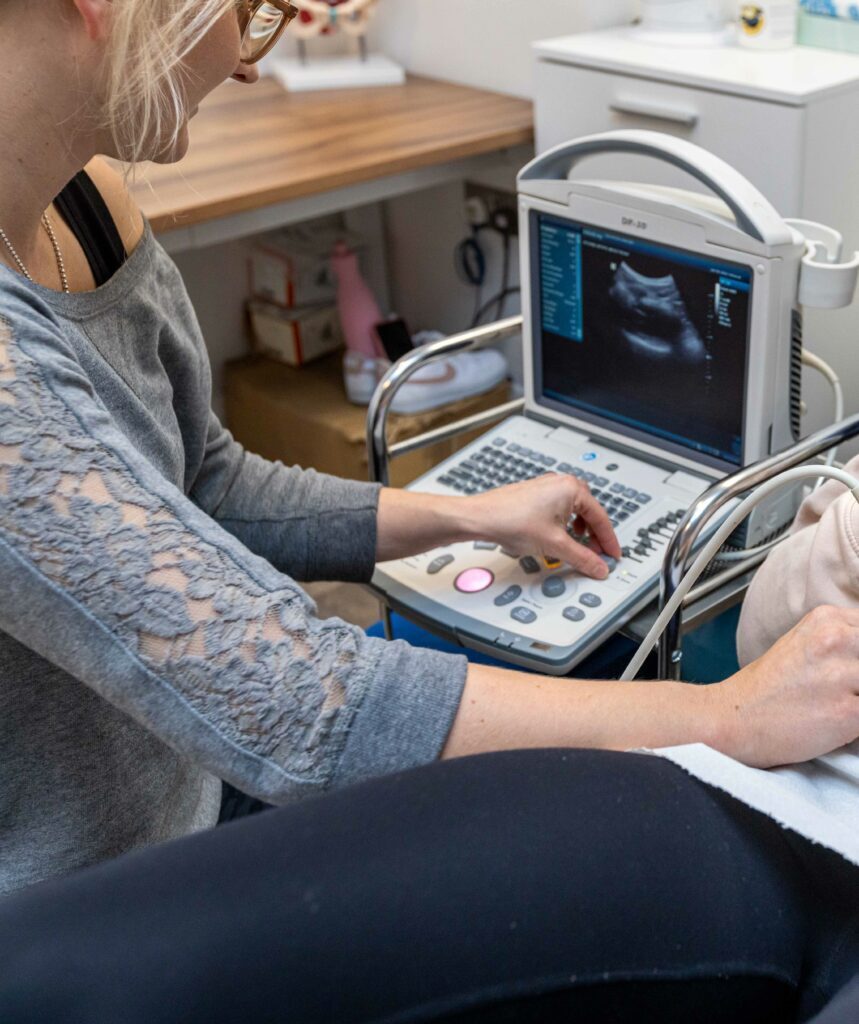 Women's Health Physiotherapy 2 Physiotherapist using ultrasound to assess pelvic floor